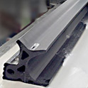 Extruded Rubber Profiles for At Grade Railroad Crossings